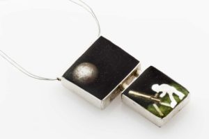 Amelina Trainor, Moongazer, Sterling Silver, brass, polymer clay, polyester resin, 2.5 cm width x 3cm height x .5 cm depth, made in Brisbane, photo: Lisa Brown