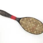 Bridget Kennedy, Soon my love, 2015, Birmingham sterling silver hairbrush made by Synyer & Beddoes 1920, Fijian pandanas fibre voivoi mat, linen thread, 190mmx73mmx8mm, photo: Bridget Kennedy