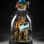 Tim Tate, Guardians of the necropolis, 2014, cast and blown glass, wood, video, 32 inches x 10 inches x 10 inches