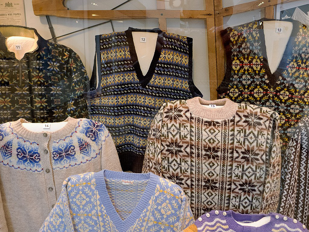 https://garlandmag.com/wp-content/uploads/2023/07/Fair-Isle-knitwear-in-the-Shetland-Museum.jpg
